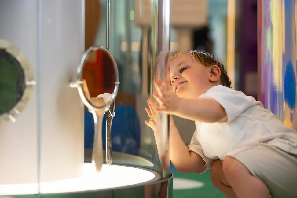 Child playing with screen
