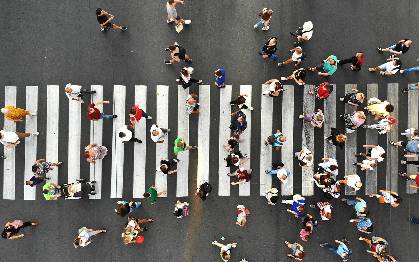 people crossing at a busy crossing