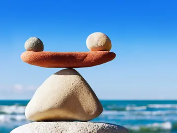 Balancing stones by the sea 