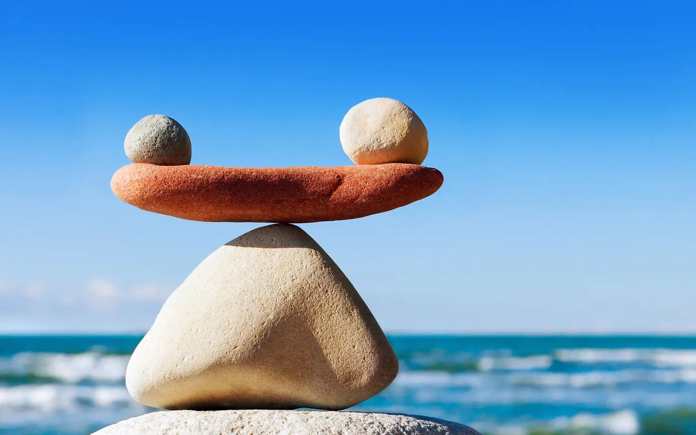 Balancing stones by the sea 