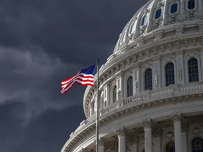 Dark sky over the US Capitol Building dome in Washington
