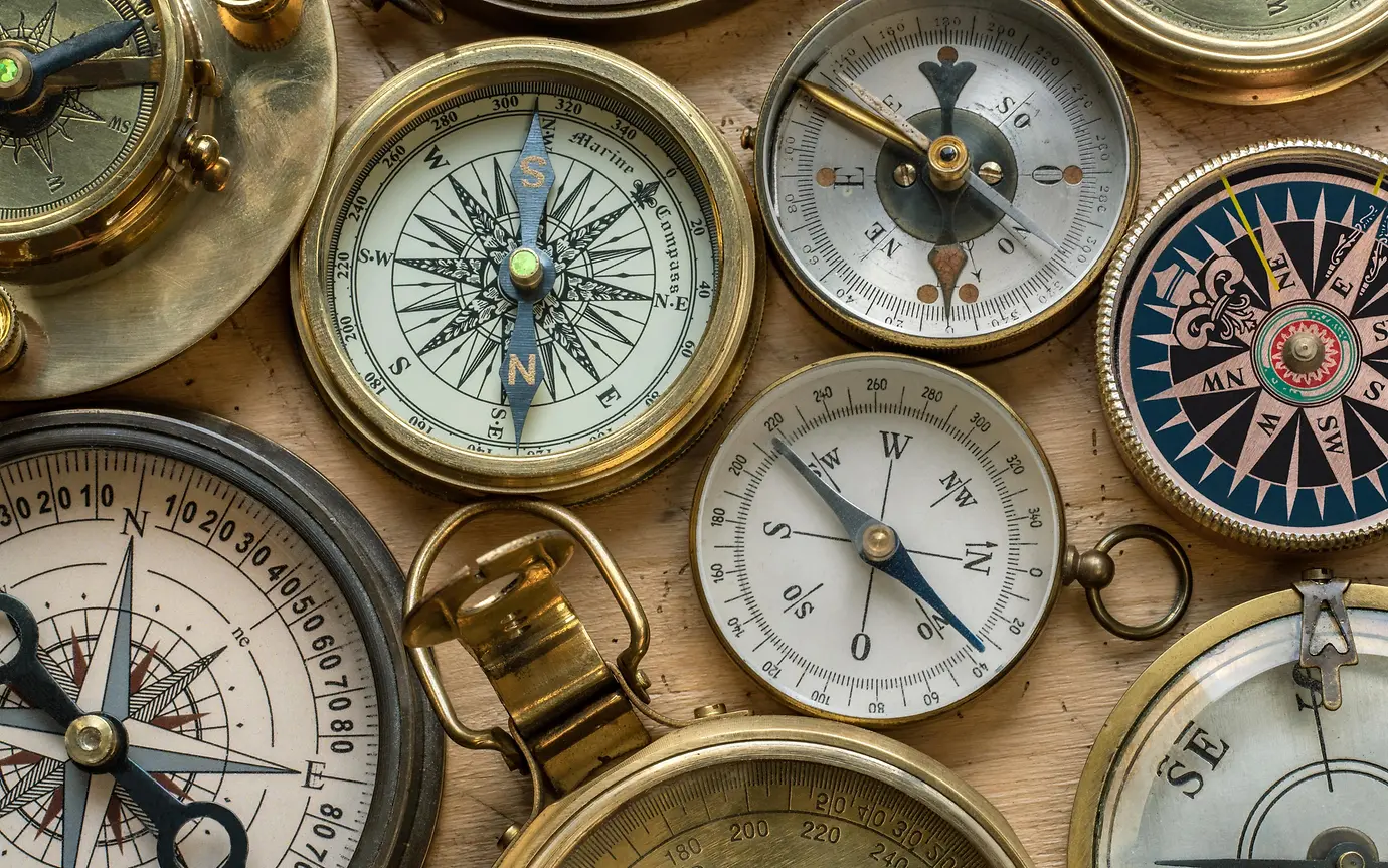 Collection set of old compasses 