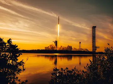 Rocket launch at sunset