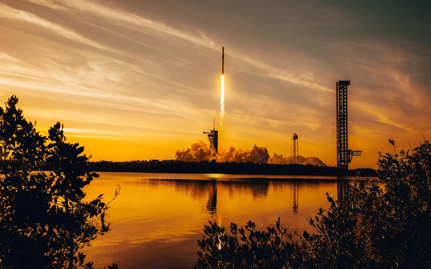 Rocket launch at sunset
